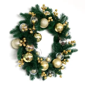 Luxury Christmas wreath with green pine needles and assorted golden decorative balls