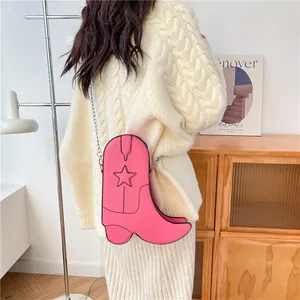 Sac à bandoulière rose élégant en forme de botte de cow-boy avec étoile brodée