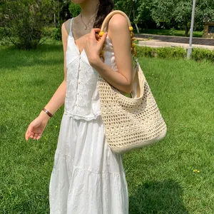Large capacity hand-woven crochet shoulder bag with wooden bead handles for beach vacation