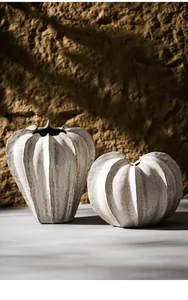 Artistic ribbed white ceramic vases for minimalist home decor and table displays