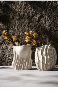 Elegant close-up of white Wabi-sabi textured ceramic vases for home decor decoration