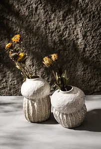 Rustic white wabi-sabi ceramic vases with unique textured finish for home decor