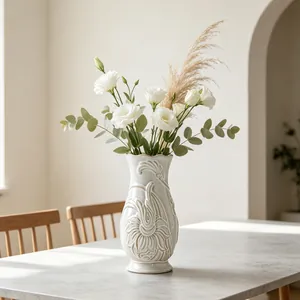 Elegant French artistic ceramic vase with embossed floral patterns for home decor detail