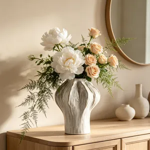 Textured white ceramic vase detail for elegant home floral arrangements