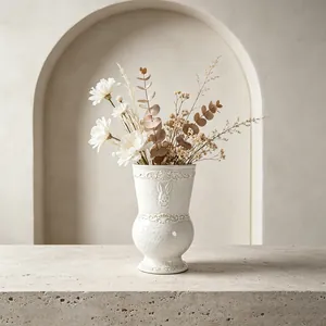 Vintage French embossed white ceramic vase with delicate floral and rabbit relief detail