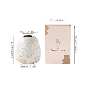 Detailed dimension view of retro ceramic vase with floral relief and gift box packaging