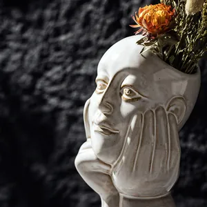 Nordic white ceramic human face vase for creative home decor and dried flowers