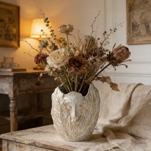 Artistic Nordic abstract face ceramic vase with leaf texture for elegant home decor