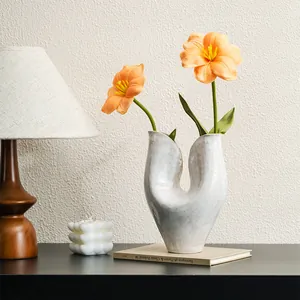 Minimalist Nordic white ceramic vase with unique U-shape design for home decor