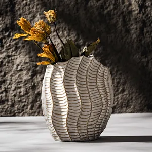 Handcrafted Wabi-sabi white ceramic vase with wavy ribbed texture for home decor