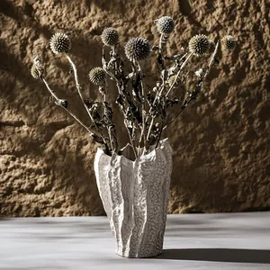 Elegant Nordic textured ceramic vase with dried globe thistle flowers home decor
