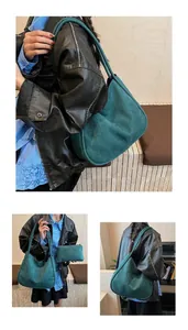 Vue détaillée d'un grand sac cabas en daim vert avec une petite pochette assortie