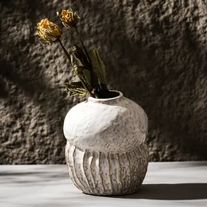 Elegant Wabi-sabi style textured white ceramic flower vase with dried roses decor