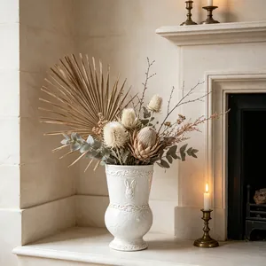 Detail view of a vintage white ceramic vase with rabbit relief decoration on a fireplace mantel.