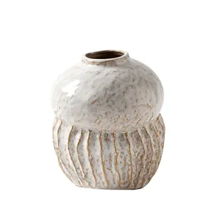 Minimalist Wabi-sabi white ceramic vase with organic texture for elegant home decor