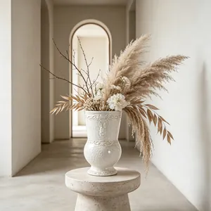 Close-up of French vintage white ceramic vase with relief detail in a modern hallway