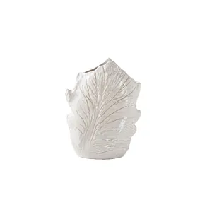 Elegant wabi-sabi ceramic vase with natural leaf vein texture for minimalist home decor