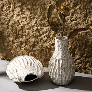 Vintage white textured ceramic vase set for dried flowers and home decoration