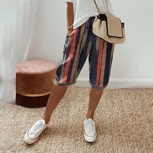 Casual women's vertical striped cotton linen shorts with elastic waist and pockets.