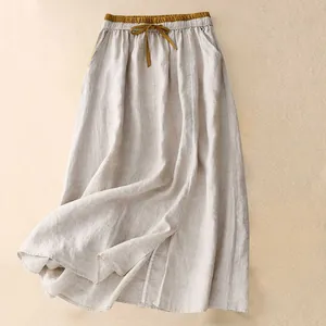 Vintage linen long skirt detail showing the elastic high waist and adjustable drawstring.