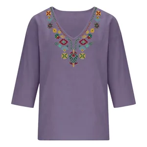 Detailed view of ethnic embroidery on vintage purple cotton linen V-neck blouse