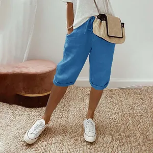 Styling of women's blue cotton linen casual cropped pants with elastic drawstring waist