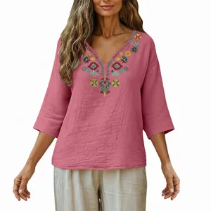 V-neck retro pink cotton linen top featuring intricate colorful floral embroidery details