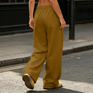 Mustard yellow high street wide-leg sweatpants featuring loose fit and back view details
