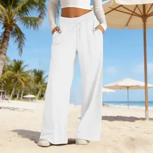 Detail view of women's white high-waisted wide-leg casual pants with drawstring waist