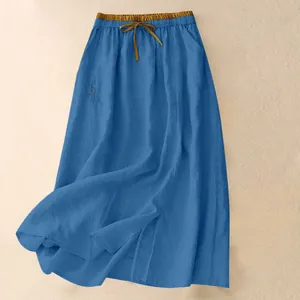 Close-up detail of high waist loose casual blue maxi skirt with adjustable drawstring