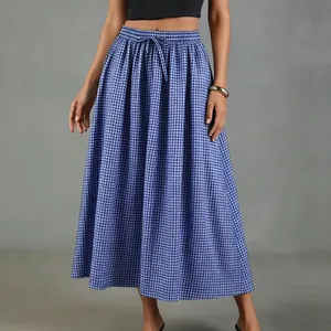 Detail shot of a blue gingham A-line midi skirt with elastic high waist and drawstring