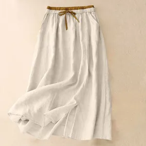 Detailed view of vintage cotton linen midi skirt with elastic drawstring waist.