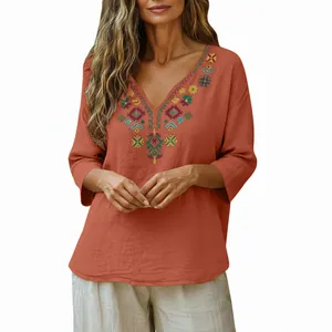 Retro V-neck cotton linen blouse with colorful heavy embroidery and 3/4 sleeves.