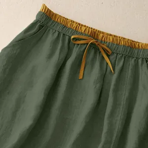 Detailed close-up of a vintage cotton linen skirt with elastic waist and drawstring
