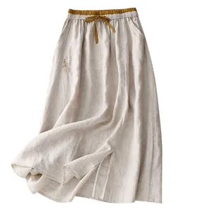 Eleganter beige Leinen-Maxirock mit hoher Taille, Kordelzug und Stickerei-Detail