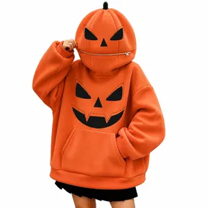 Vista dettagliata della felpa con cappuccio a zucca di Halloween con maschera a cerniera