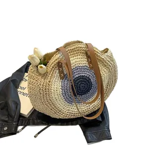 Fashionable round woven straw beach shoulder bag with blue circular pattern for women