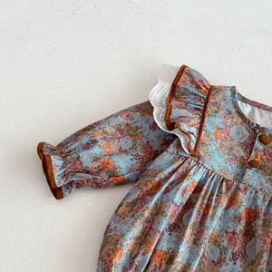 Cute baby girl long sleeve floral romper with lace ruffle and brown piping detail infant clothes