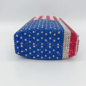 Detailed side view of an American flag patterned rhinestone evening clutch bag.