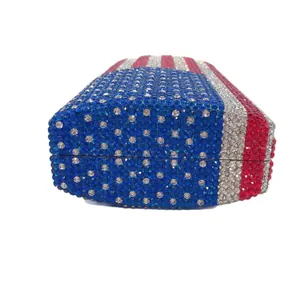 Side detail view of a glittering full rhinestone American flag pattern evening clutch bag