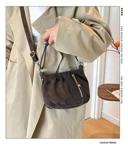 Stylish autumn winter commuter shoulder bag for women, versatile crossbody handbag with zipper.