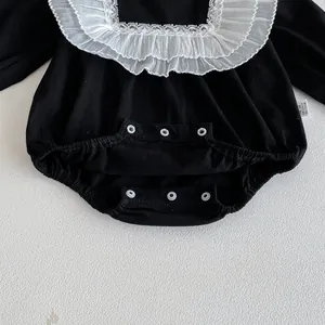 Black baby long sleeve romper with white lace collar, 100% cotton infant clothing detail