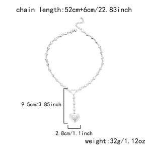 Detailed size measurements for silver heart locket pendant necklace on white background