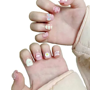 Cute pink press-on nails for toddlers with 3D rabbit, heart and egg art designs