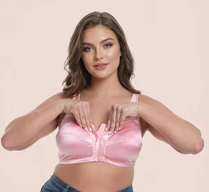 Detail of a pink satin wireless plus-size bra featuring a convenient front-closure.