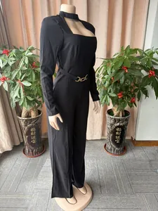 Detailed side view of elegant black long sleeve wide leg jumpsuit with choker neck cutout