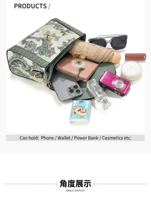 Top view of vintage paisley handbag showing large capacity with daily essentials inside.
