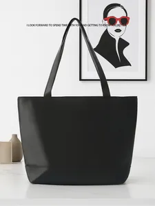 Minimalist black tote bag, large capacity PU leather shoulder bag for daily commuter.