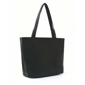 Black large capacity tote bag for women, stylish PU leather shoulder handbag for daily work commute.