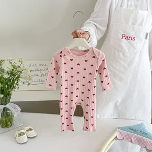 Cute infant baby girl long sleeve cotton romper featuring sweet red heart print design.